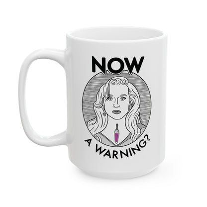 White mug with a graphic design featuring a woman's face and text on a white background
