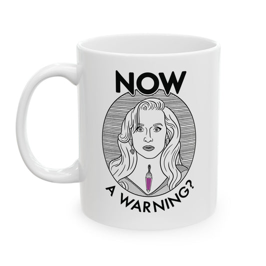 White mug with a graphic design of a woman's face and text on a white background